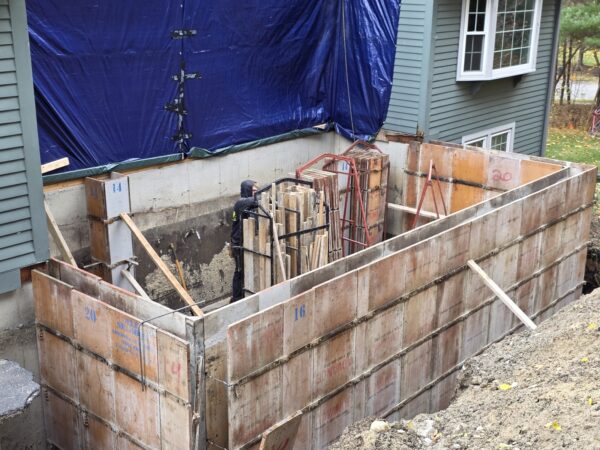 Foundation wall forms going up for the Westford home addition Foundation wall forms going up for the Westford home addition