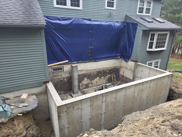 Poured concrete foundation for the Westford, MA home addition Poured concrete foundation for the Westford, MA home addition