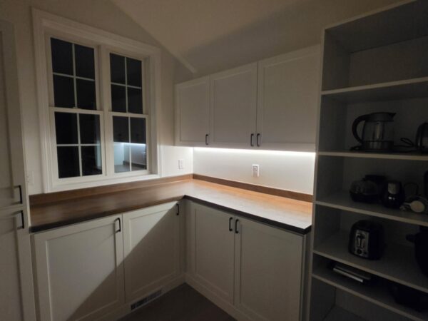 Pantry with white cabinets, butcher-block counter and open shelving, Westford project Pantry with white cabinets, butcher-block counter and open shelving, Westford project